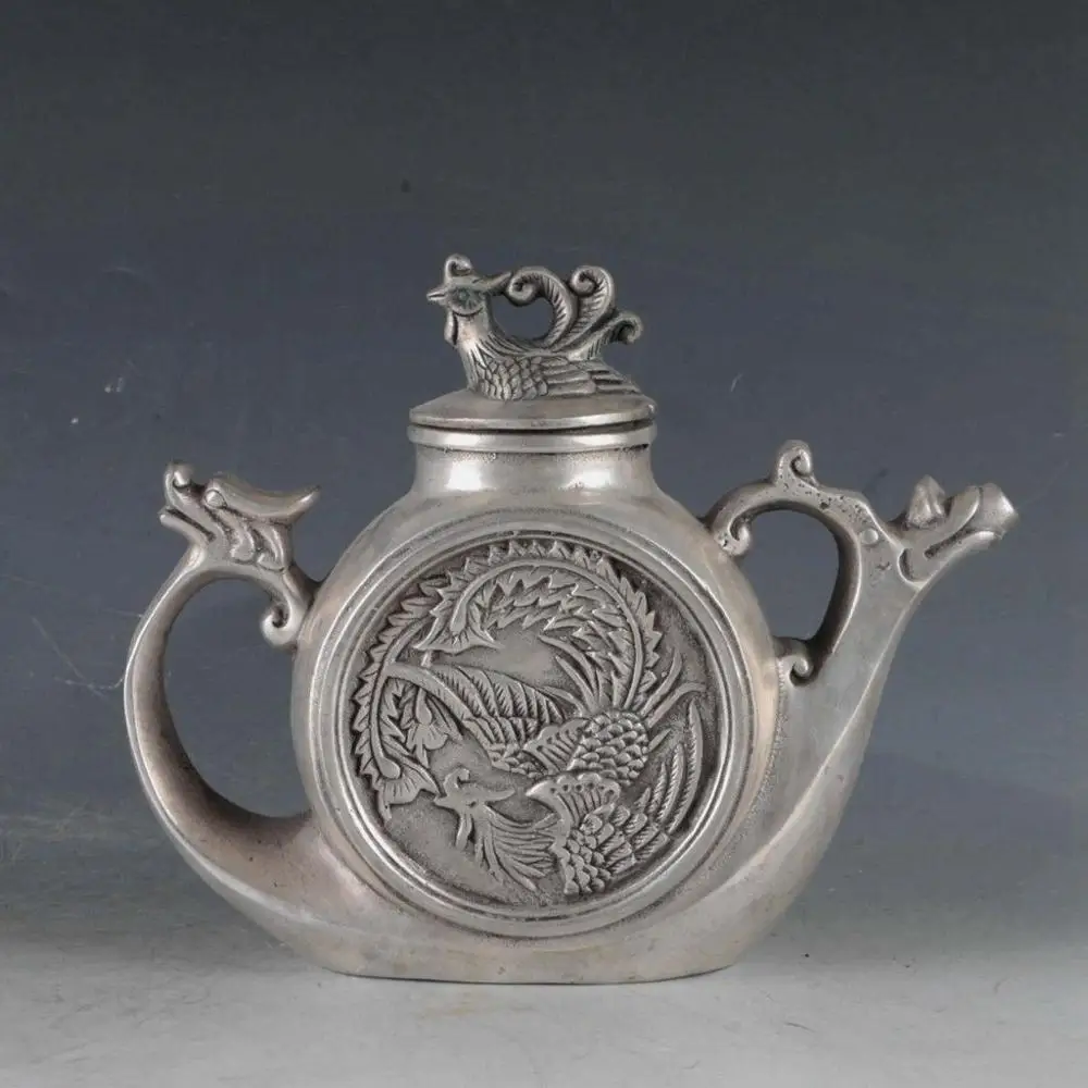 

Chinese Silvering Copper Dragon&Phoenix Teapot Made By Royal DaQing