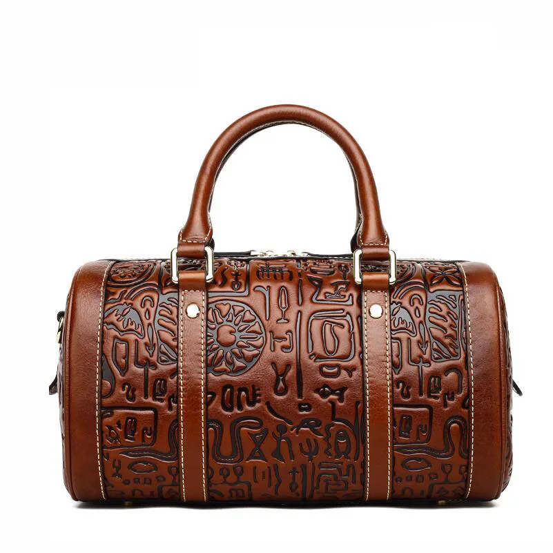 

Famous brand top quality Cow Leather women bag    Retro Messenger Bag Chinese wind bag is embossed Boston handbag