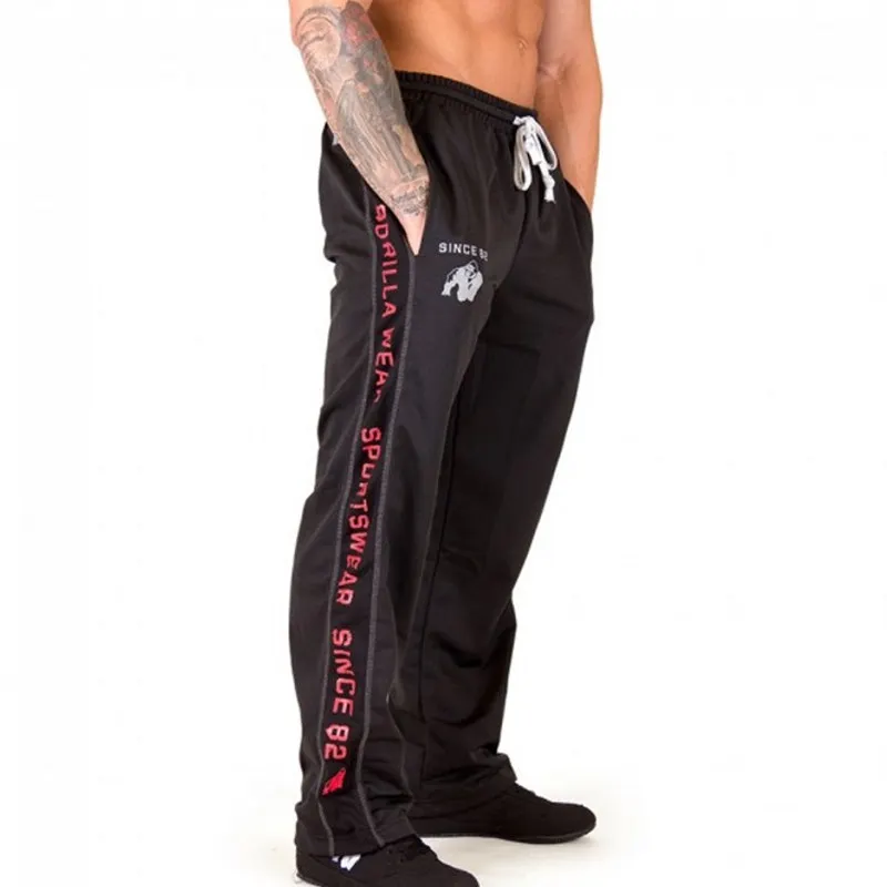 2018 الخريف جديد الرجال فضفاض Sweatpants رجل الجمنازيوم اللياقة البدنية تجريب العلامة التجارية السراويل الذكور تنفس شبكة سريعة الجافة عداء ببطء ال...