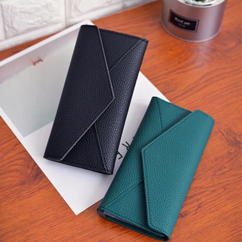 

New Korean version of the wallet female long retro lychee pattern purse female card package coin bag