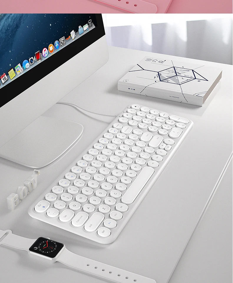 O teclado com fio usb ergonômico de