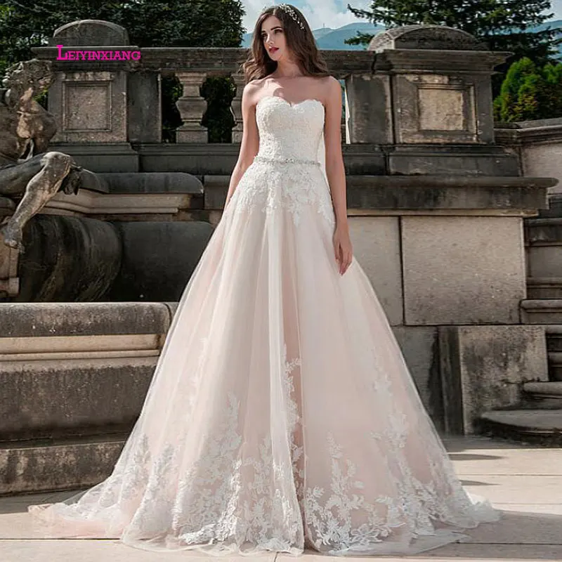 

LEIYINXIANG New Arrival Wedding Dress Bride Dress Vestido De Noiva Sereia Robe Sexy Ball Gown Backless Luxury Elegant Appliques
