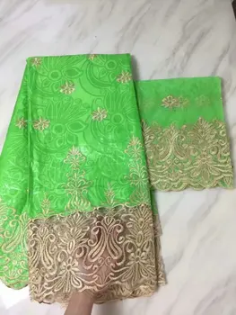 

african lace fabrics Fashion embroidery bazin riche getzner with beads nigerian bazin lace fabric 7 yards green gold line