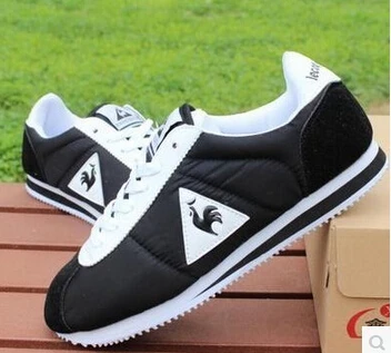 marca de zapatos que tiene un gallo