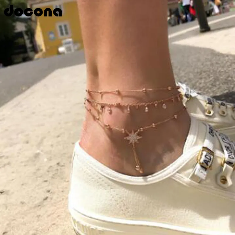 

Docona New Beach Gold Metal Chain Star Bell Drops Crystal Layered Anklets For Women Charm Boho Statement Foot jewelry 7118