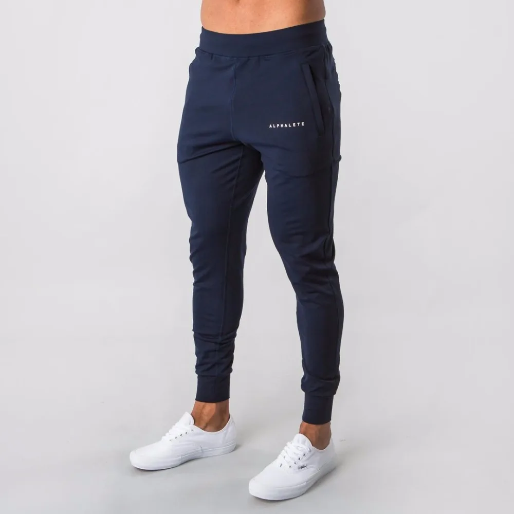 2019 جديد نمط رجل ALPHALETE عداء ببطء Sweatpants رجل الجمنازيوم تجريب اللياقة البدنية سراويل قطنية الذكور عارضة الأزياء نحيل السراويل الترنك