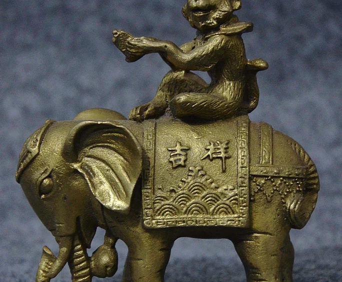 

Old China Auspicious Brass Wealth Monkey Hold Seal Signet Ride Elephant Statue