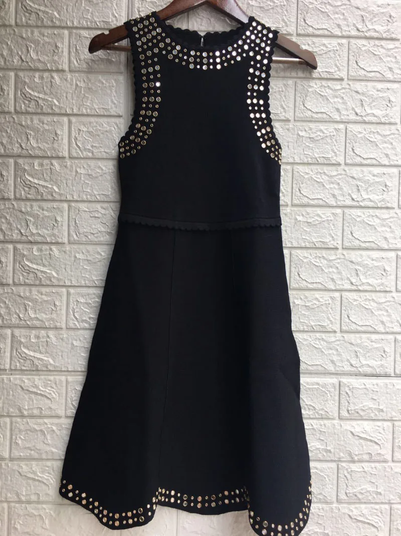

Woman Fashion Black SHORT KNIT DRESS TRIMMED WITH STUDS Scalloped neck armholes Cinched waist Slim KNITTED Jersey dress