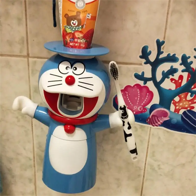 Doraemon Прекрасный автоматический Зубная паста экструдер мультфильм мыть костюм Детская зубная щетка стойки всасывания стены зубная паста экструдер