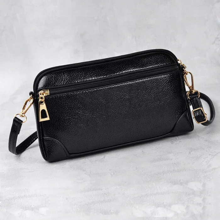 

New one shoulder slung hand with change key large screen mobile phone wrist bag ladies bag fashion large capacity long
