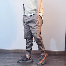 2017 neue hohe qualität straße hip hop männer casual hosen mehrfach mode lose lange hosen männlichen elastische taille cargo pant