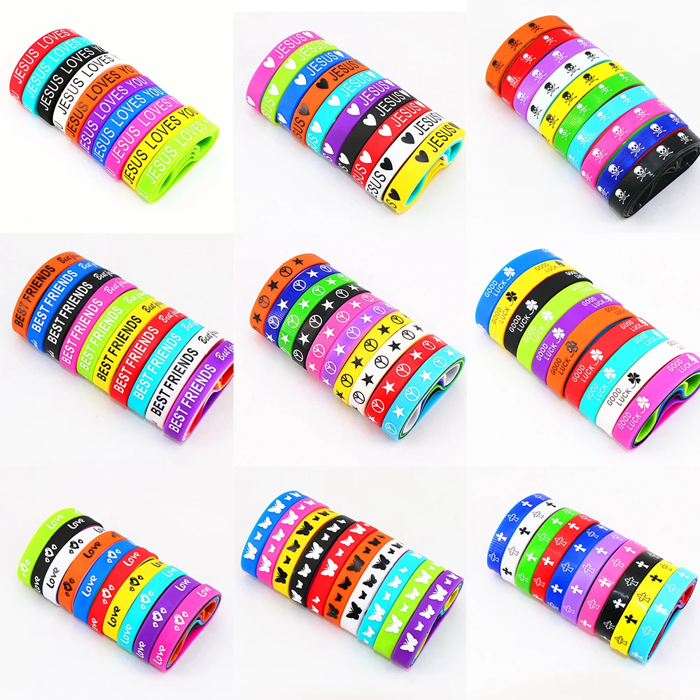

Fashion 10pcs/Lots Cross Jesus Skull Peace Goodluck Love Butterfly Bestfriend Silicone Elastic Cuff Bracelet For Men Women