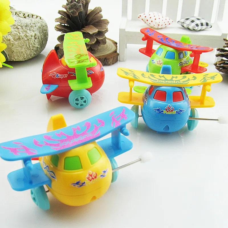 

1pcs Mini Kids Clockwork Toys Cartoon Plastic Airplane Model Wind Up Toys Running Toy for Children Gift Random Color