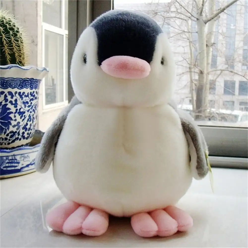 peluche pinguino bebe
