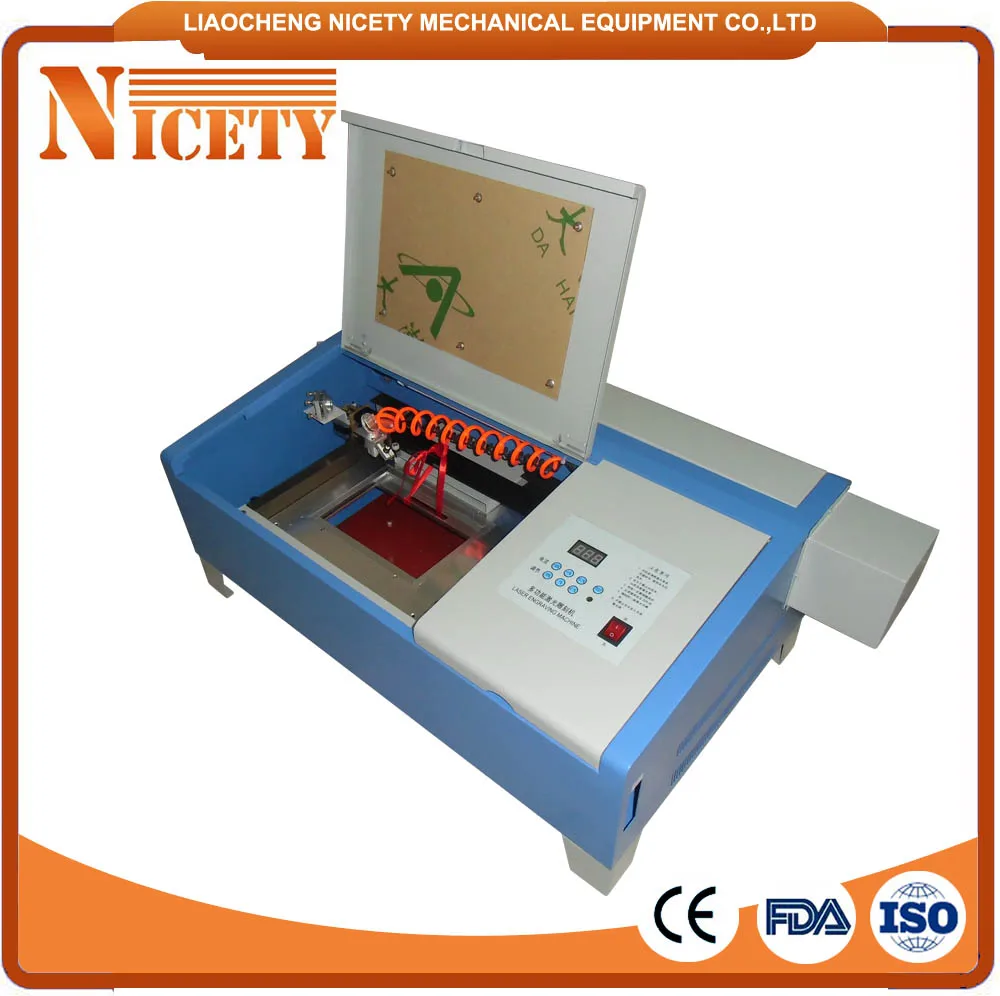 

Mini laser cutter with 50 W CO2 laser tube for arcylic/ plywood /organic glass NT-3020B