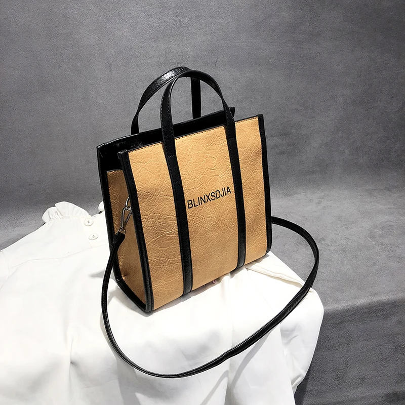 

2018 summer new fashion handbag female retro letter large capacity simple shopping bag Messenger bag.