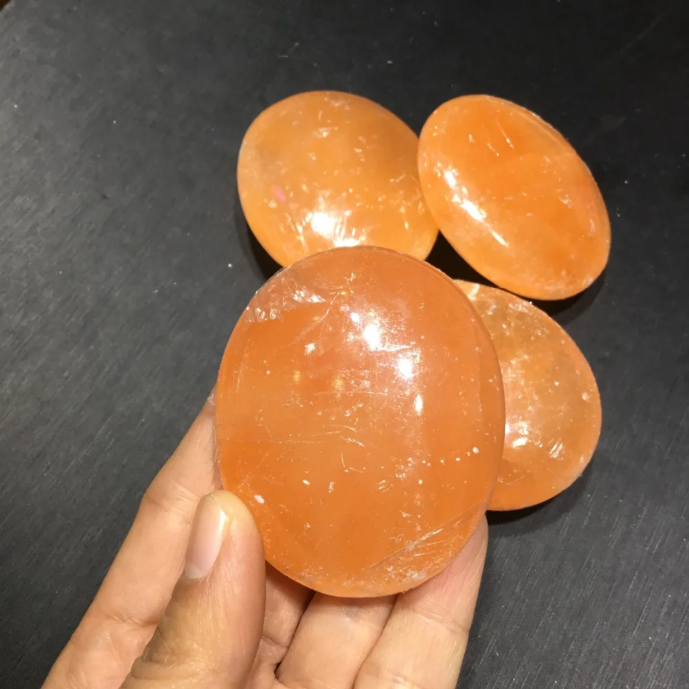 

Natural orange selenite palm stone polished gypsum crystal palm healing stone