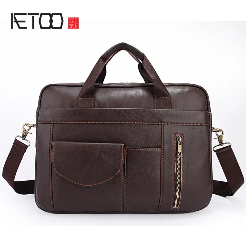 

AETOO Solid color business briefcase Korean version of the leather men 's bag leisure men' s Messenger handbag head layer of lea