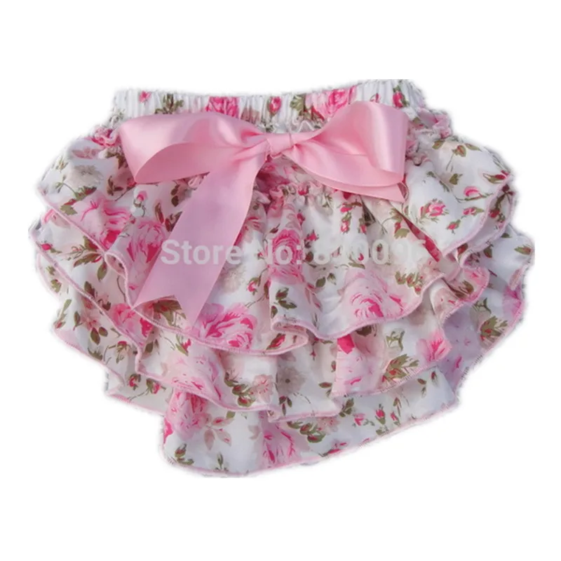 Baby Bloomers By bloomers, I mean white shorts with elastic on the legs that are kind of lacy/frilly. I would like to find a pair for a Halloween costume, but I am at a complete loss of where I can find them. One thing I do not want to do is purchase them secondhand.