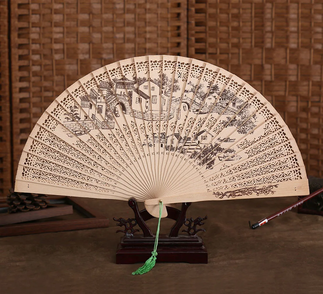

2019 NEW Chinese Traditional Hollow Fan Wooden Hand Made Exquisite Folding Wedding Gift Bamboo bone performance sandalwood fan