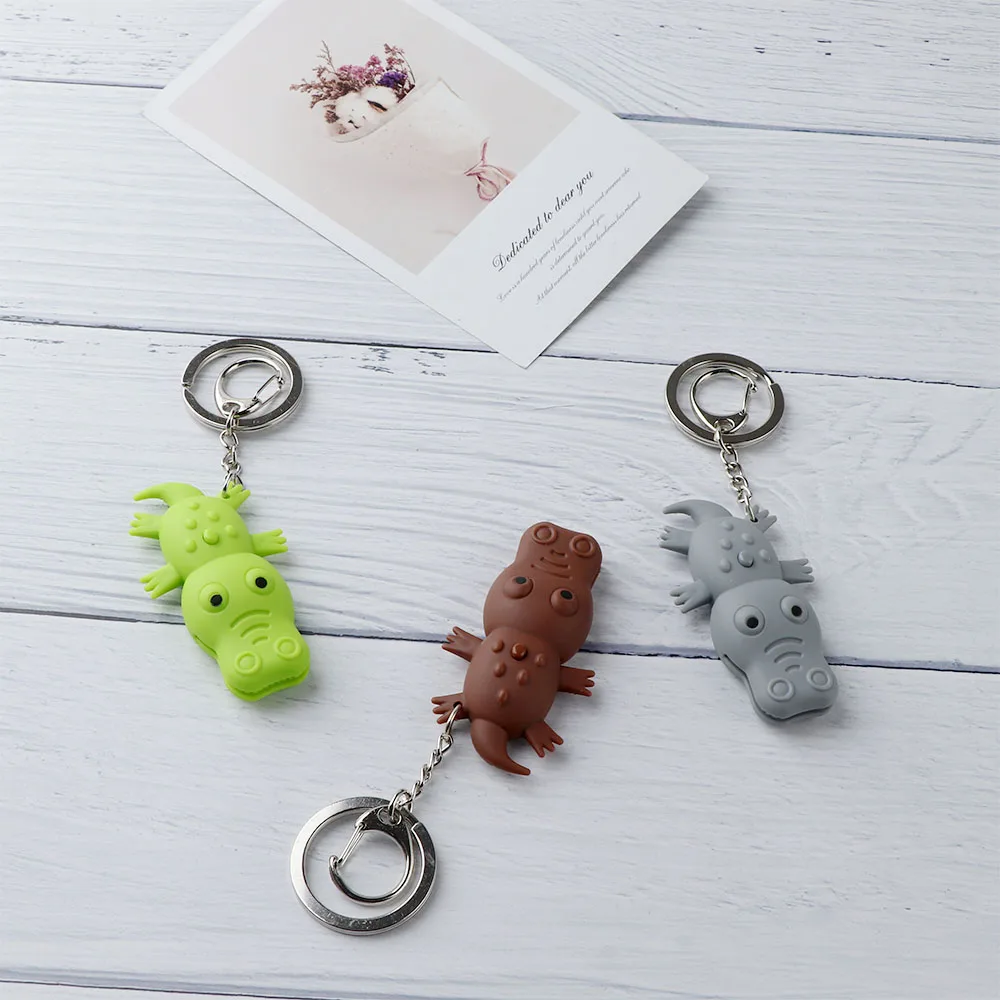 

Brand New and High Quality Lovely Crocodile Shape LED Toys with Sound Mini Torch Flashlight Kids Light-Up Toys Gifts