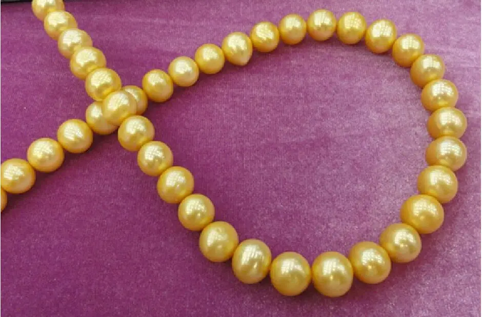 

HUGE 10-11MM Australian south sea golden pearl necklace 18 inch 14k (9.13)