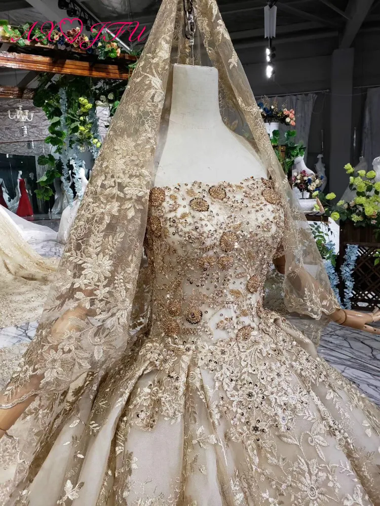 AXJFU роскошное Золотое кружевное платье принцессы без бретелек с бисером и золотым цветком, блестящее свадебное платье с вуалью настоящая фотография 1499
