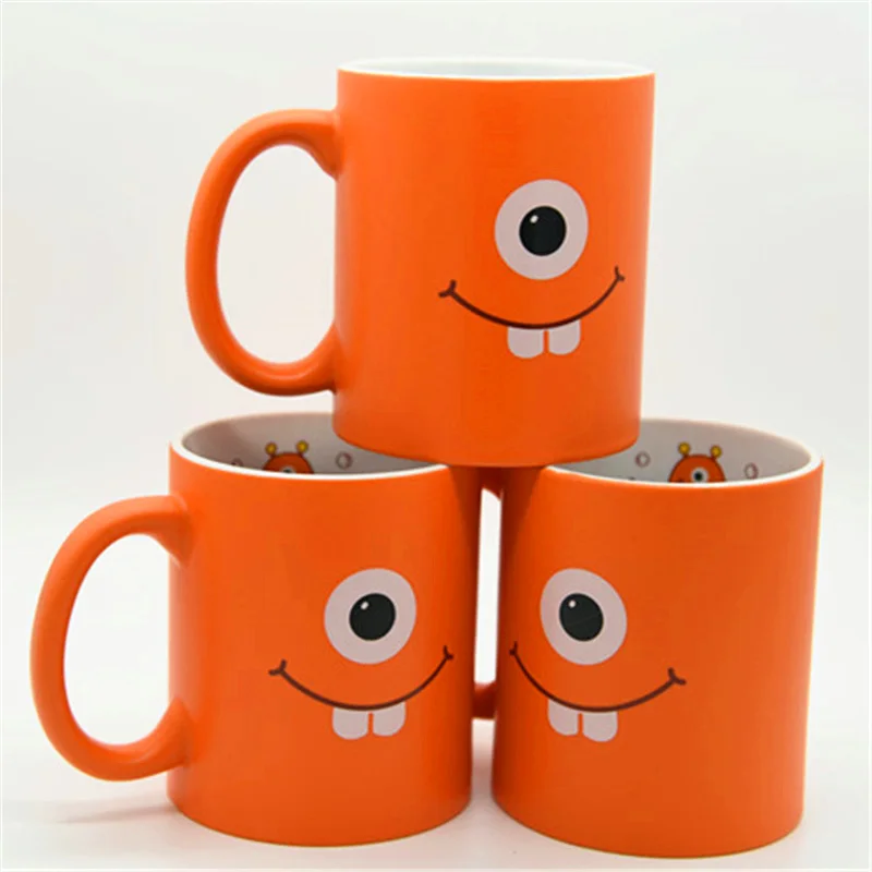 

Funny Mug Orange Color Ceramic Mugs Adorable Single Eye Teeth Coffee Cup Mug Cheap Ceramic Mug China High Quality Cup Cute