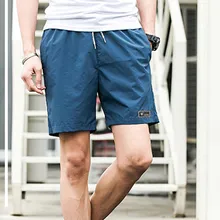 Мужские спортивные короткие брюки с эластичным шнурком для тренировок на весну и лето TC21