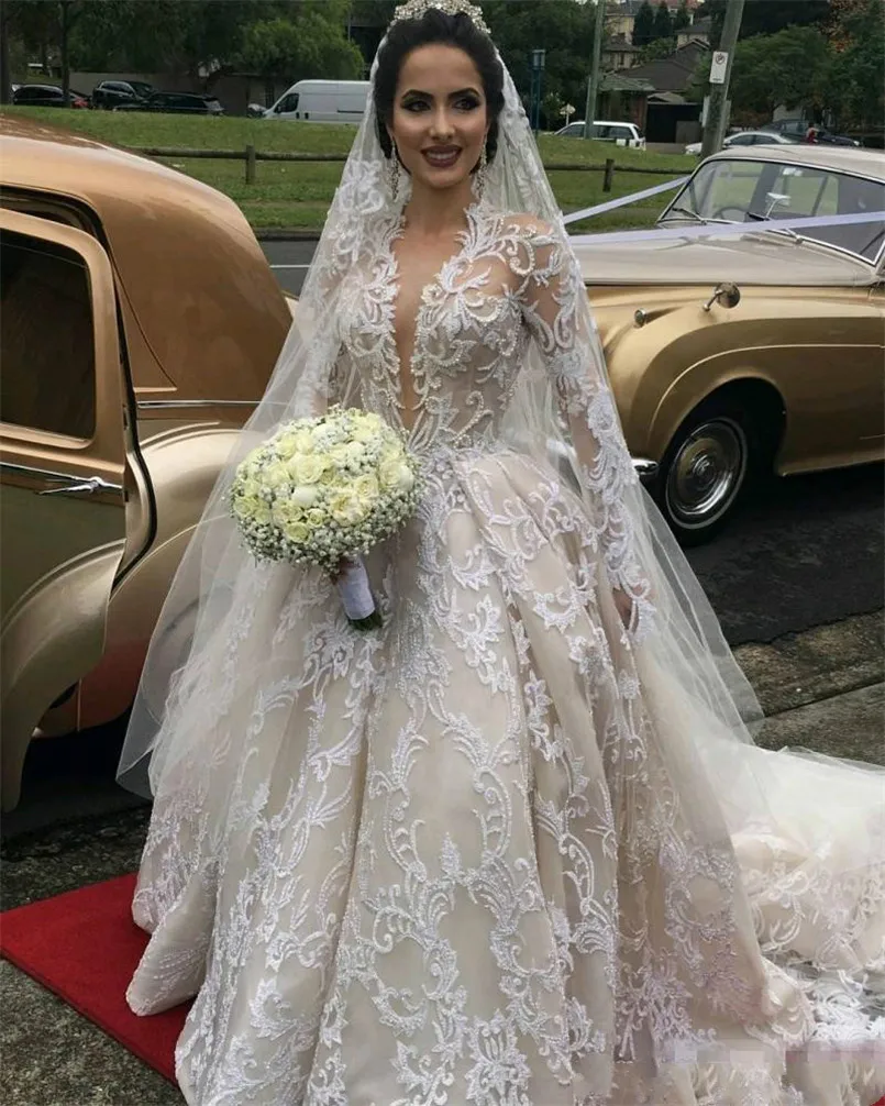 Gorgeous-Lace-Luxury-Wedding-Dresses-2018-Illusion-Long-Sleeves-Deep-V-Neck-Bridal-Gowns-Royal-Cathedral (3)