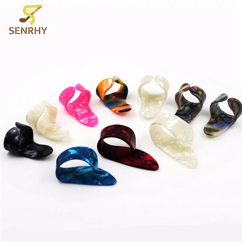 

Random Color 4pcs/Set New Guitar Thumb Finger Picks Paddles Plastic Nail Plectrums Guitar Picks Plectrum Set For Guitar