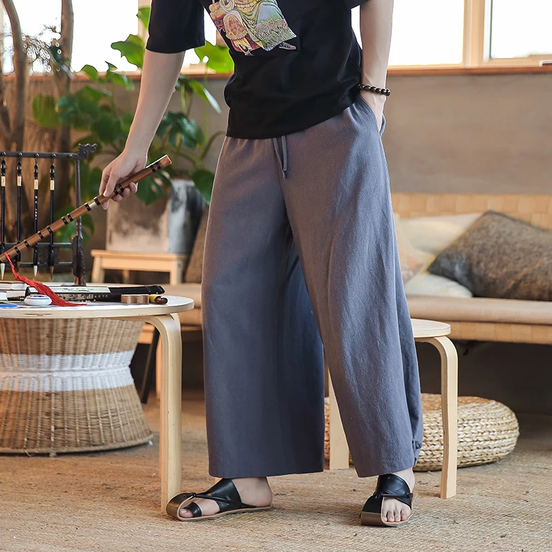 

Chinese style wide-legged pants male loose thin cotton linen pants men solid drawstring oversized casual straight harem pants