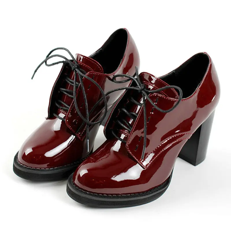 burgundy and black dress shoes