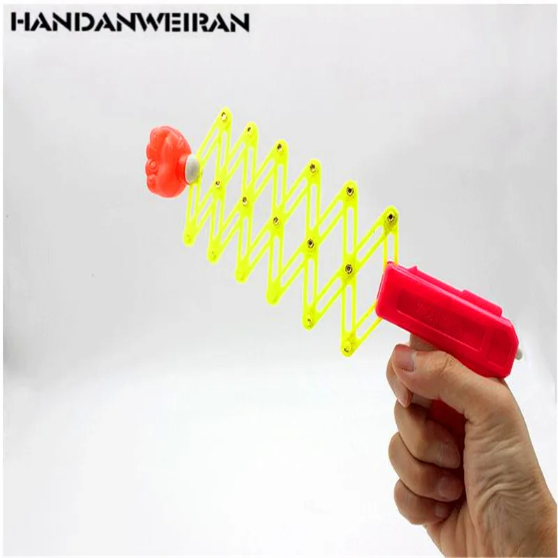 

1PCS Children's gags toy gun novelty practical creative telescopic fist mini funny bomb Spring magic small toys for boy