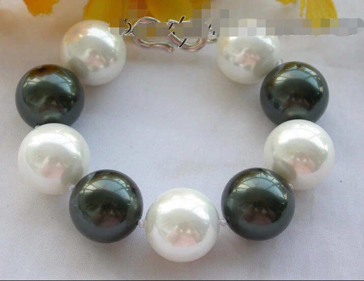 

Free shipping >>>>>>z4237 8" 20mm WHITE BLACK ROUND SOUTH SEA SHELL PEARL BRACELET