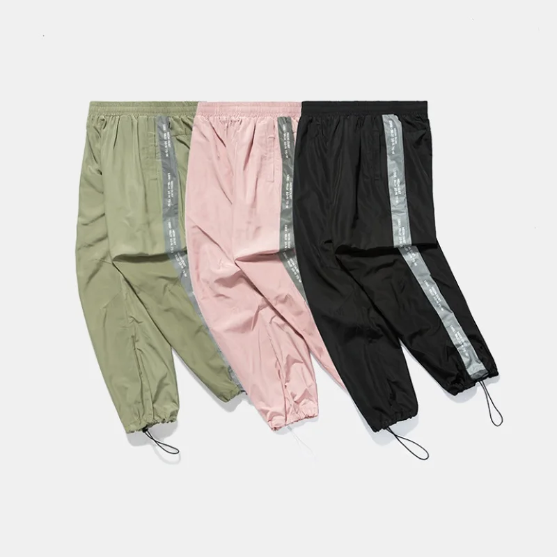 Herbst und winter high street hip hop brief druck seite reflektierende einstellbaren Kordelzug strahl fuß männer casual hosen