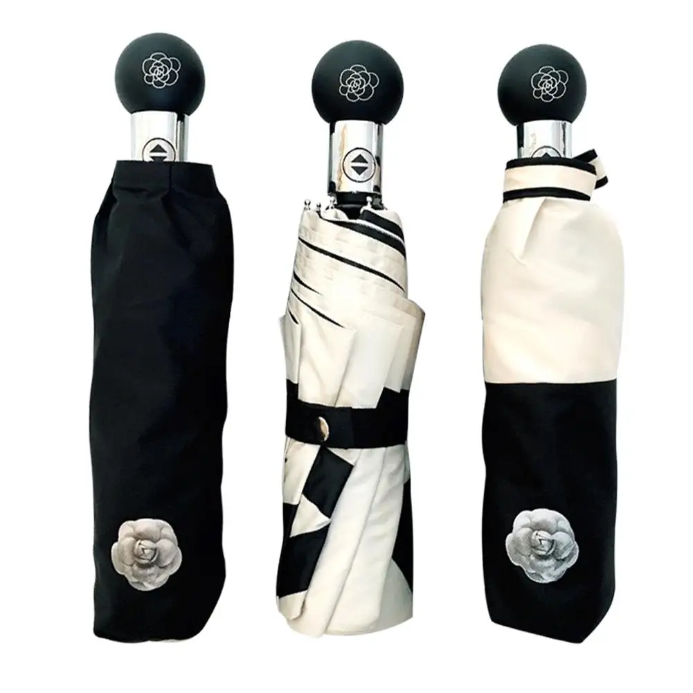 

Camellia Automatic Simple Black Plastic Sunscreen Anti-UV Sun Umbrella Three Folding Umbrella High Quality New Fashion 2019 new