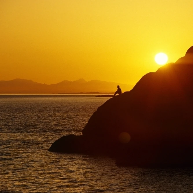 Silhouette Of Person On Rock Turnagain Arm Sc Ak Poster Print (34 x 22)
