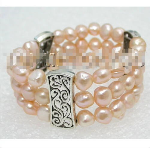 

Free shipping >>>>>>Wonderful 3rows 9mm natural pink baroque pearls rubbery bracelet E1134