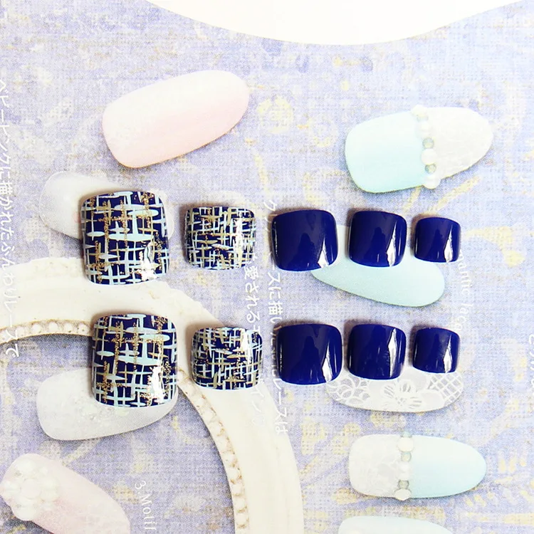 

24pcs Cute Blue Toe Nail Tips with Marble Cross Pattern Oval Foot Fake Nails in Acrylic Box Designs Long Nails with Glue Sticker
