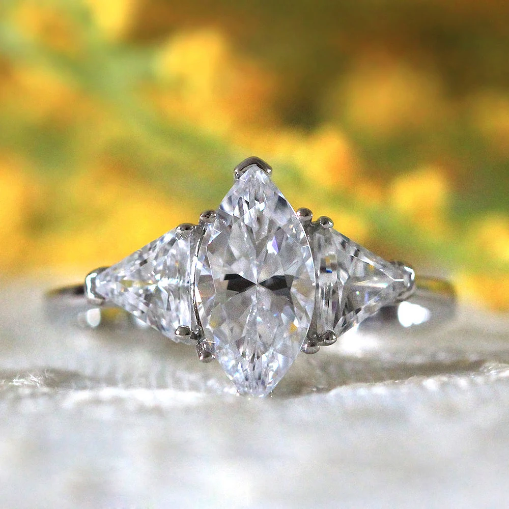Luxurious 14x7mm Marquise Cut Moissanite Halo Wedding Engagement Ring 14K White Gold Soliarite with Thrillion Cut Moissanite Luxurious 14x7mm Marquise Cut Moissanite Halo Wedding Engagement Ring 14K White Gold Soliarite with Thrillion Cut Moissanite