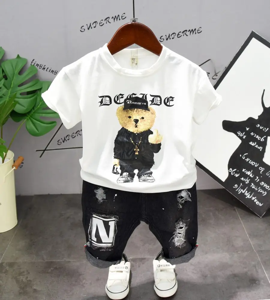 

Baby Boy Clothes Set 2019 Summer New Korean Cartoon Bear Short Sleeve T-Shirt Top+Cutout Jeans 2PCS Bebe Jogging Suit Tracksuits