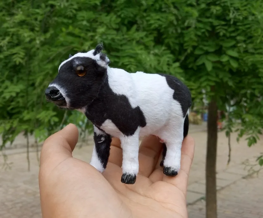 

Модель игрушечного скота из полиэтилена и пуха, 11x4x8 см