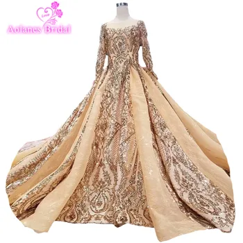 شراء2018 فاخر الشمبانيا الذهب شريط ترتر س الرقبة قطار مصلى زي العرائس طويلة الأكمام بلا ظهر الكرة ثوب بلا ظهر فساتين الزفاف