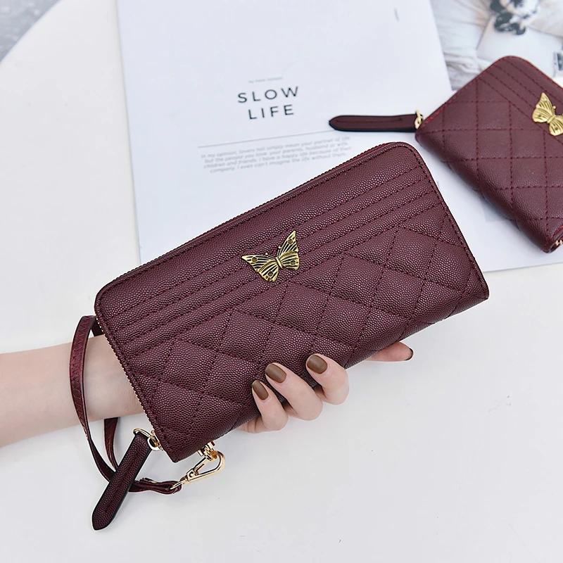 

2019 new women's wallet Europe and the United States retro wild wallet fashion card package rhombic embroidery line zipper walle