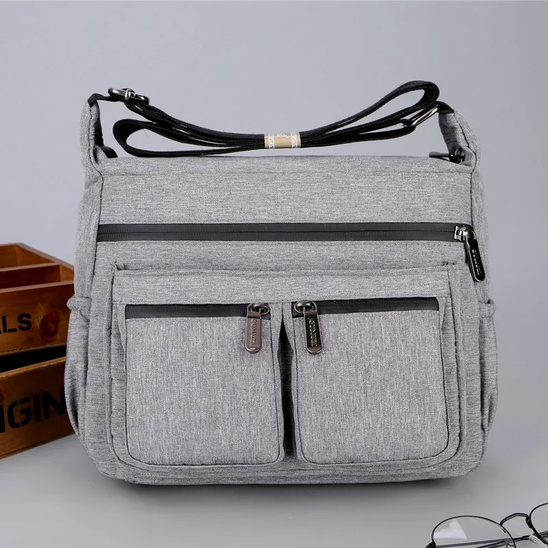 

2820 New High Density and Ultra Light Fashion Men's Messenger Bags Waterproof Oxford Textile Large Capacity Men Bag