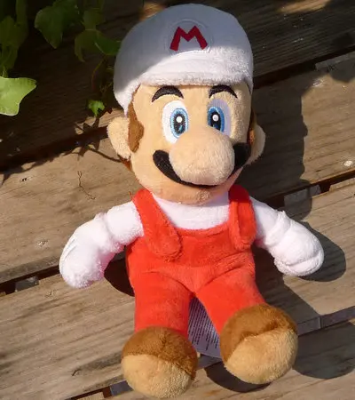 В руке оригинальные Super Mario Bros. Вечерние плюшевые куклы с набивным животным 7 &quot16