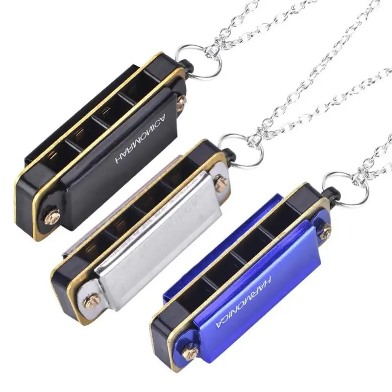 

Mini Harmonica Portable 4 Hole 8 Tone Necklace Type Harmonica Necklace Toy Musical Instruments 3 Colors