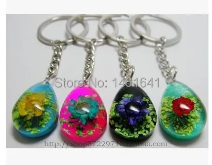 

Key chain you dry flower amber key ring flower amber technology presents random delivery 1 PC