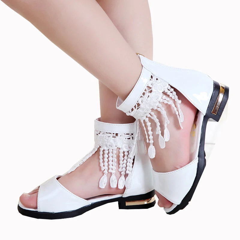 white tassel sandals